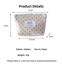 Detailed size specifications for the polka dot heart makeup bag with zipper closure