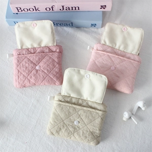 Quilted fabric card holder pouch with snap closure in three soft colors for organization