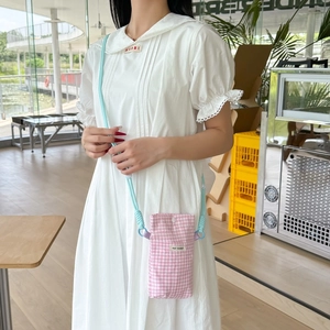 Pink checkered crossbody phone pouch with blue rope strap and MAY RABBIT label
