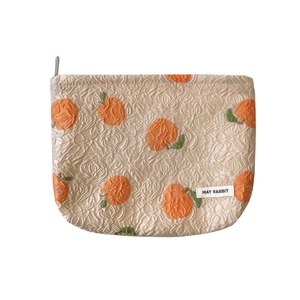 Floral jacquard cosmetic bag with orange fruit pattern and secure zipper closure