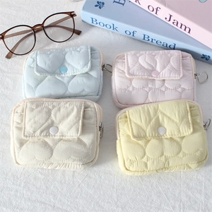 Quilted heart coin purses in macaron colors with flap pockets and zipper rings