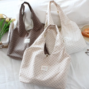 Large canvas tote bags with heart patterns in cream and coffee colors for women