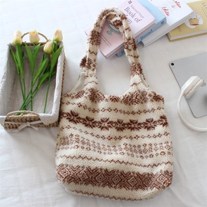 Macro shot of ethnic pattern texture on soft plush winter tote bag with fleece details