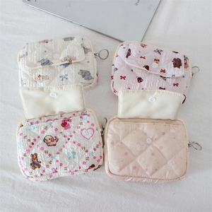 Quilted cartoon coin purses with cute animal prints and secure resin snap closure