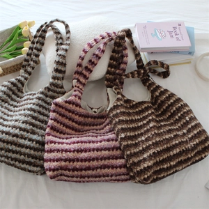 Three large capacity ethnic style plush tote bags with striped patterns in assorted colors