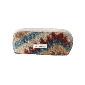 Fluffy plush pencil case with colorful block patterns and May Rabbit woven label
