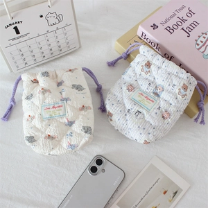 Quilted cotton drawstring pouch with cartoon elephant and bear patterns for camera storage