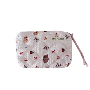Pink quilted cotton makeup bag with vintage bear patterns and soft wrist strap handle
