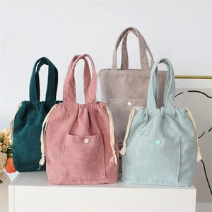 Minimalist corduroy drawstring handbags in four solid colors with front snap pockets