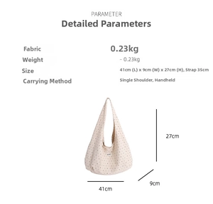 Polka dot canvas shoulder bag specifications showing size 41x9x27cm and strap length