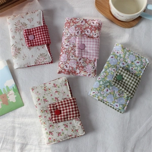 Floral fabric book cover set with soft quilted cotton and stylish checkered button closure