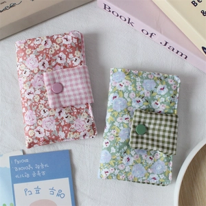Handmade floral fabric book covers with cotton padding and button closure