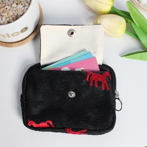 Black plush wallet with red horse embroidery and interior card slots on white background