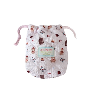 Quilted pink cotton drawstring storage bag with cartoon bear and cake patterns