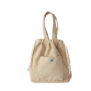 Minimalist beige corduroy drawstring handbag with turquoise button pocket and top handles
