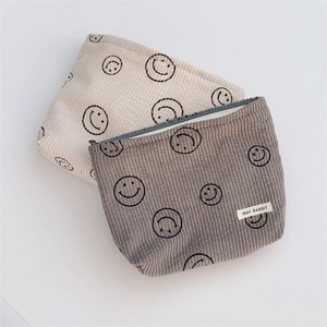 Corduroy polka dot smiley makeup bag set in beige and taupe colors with zip closure