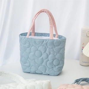 Light blue quilted handbag with pink handles and 3D floral pattern for baby stroller storage