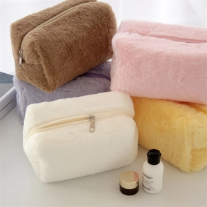 Soft macaron plush cosmetic bags in multiple colors with metallic zip and handles
