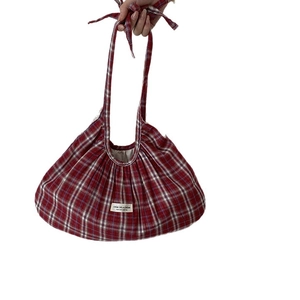 Red and white checkered tote bag with shirred cloud-like texture and soft top handles