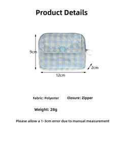 Tableau des tailles détaillé pour pochette en polyester matelassé bleu de 12x9x2cm