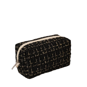 Large capacity black and gold tweed makeup bag with woven pattern and zipper closure