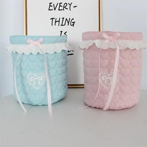 Pastel heart quilted storage baskets with white lace trim and pink ribbon bows