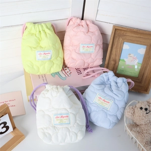 Quilted heart drawstring bags in pastel colors for camera and small accessories storage