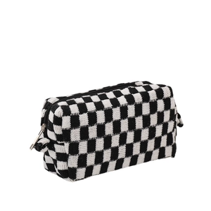 Checkboard knit cosmetic bag with black zipper closure and high-capacity storage design