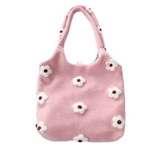 Pink plush tote bag with white flower embroidery and chic black checkered lining