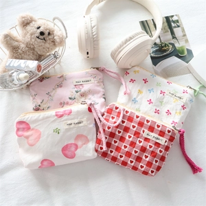 Mini floral bow handheld storage bag for earphones and coins with woven wristlet strap