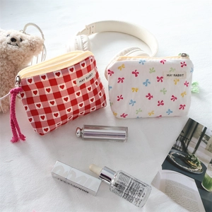 Mini floral bow pouch and red heart plaid coin purse with convenient carrying strap