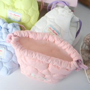 Quilted macaron drawstring bags for instant camera protection and organized storage