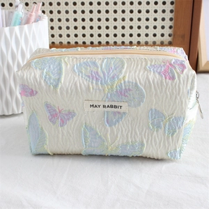 Floral jacquard pouch with butterfly pattern, zip closure and MAY RABBIT label detail