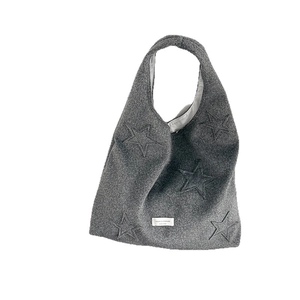 Deep grey felt tote bag with embroidered stars and a casual minimalist design