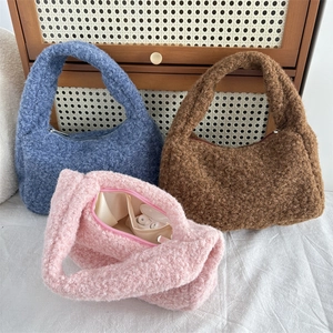Fuzzy faux fur handbags in blue brown and pink with spacious interior and soft texture