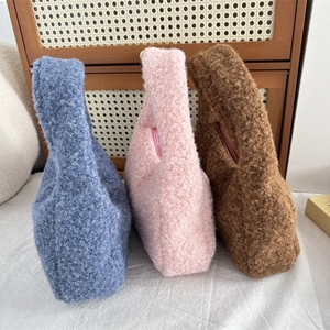 Three plush lamb wool tote bags in blue pink and brown for stylish autumn winter outfits
