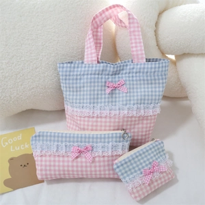Detailed set of cute pink and blue plaid makeup bags with lace trim and bow decorations