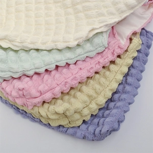 Macro shot of 3D bubble textured seersucker fabric in pastel colors for shoulder bag