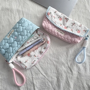 Quilted floral pencil case set with heart patterns and soft handles for stationery storage