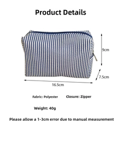 Detail view of blue striped seersucker pouch with zipper closure, 16.5cm polyester bag