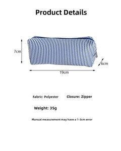 Detailed view of blue and white striped seersucker pencil case with dimension 19x7x6cm