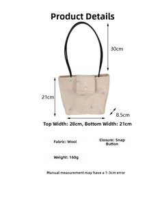 Detailed dimension guide for beige tote bag with blue bow embroidery and snap closure
