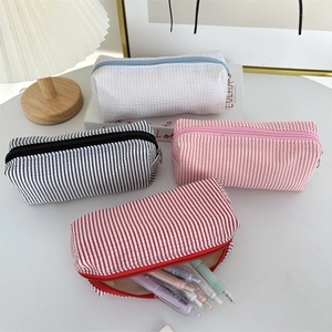 Large capacity seersucker pencil case with minimalist stripes and waffle texture