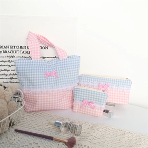 Detailed set of lace bow storage bags with blue plaid and pink floral patterns