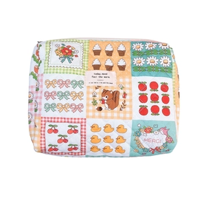 Quilted cotton floral storage bag with colorful cartoon patterns and zipper closure