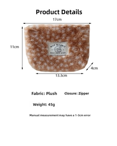 Detailed view of plush leopard print makeup bag dimensions with zipper and logo label