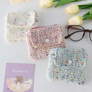 Chic tweed mini coin purses in cream, pink, and blue with gold zippers and snap buttons