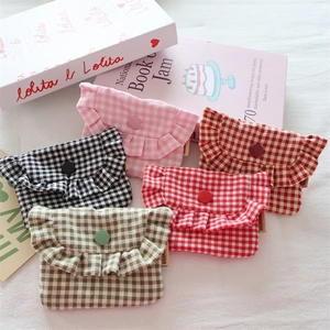 Mini plaid storage bags with ruffle trim and button closure in five assorted colors