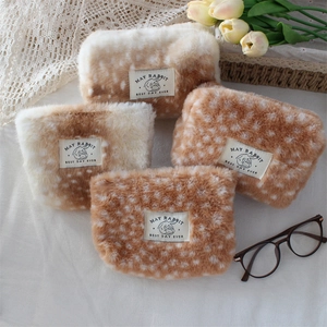 Set of four plush deer-patterned cosmetic bags in high-density soft faux fur