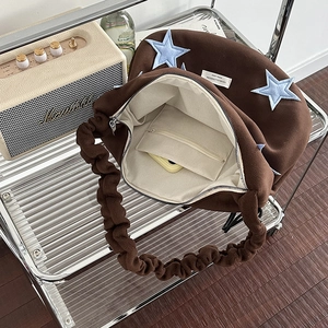 Brown wool shoulder bag with blue star patches and adjustable pleated straps